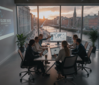 Team meeting in Dublin office with city river view at sunset