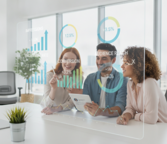 Team reviewing marketing analytics dashboard in bright office